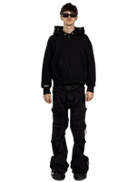 Front view of a model wearing a Starlit fur hoodie without fur, highlighting the luxurious fur details and contemporary streetwear style.